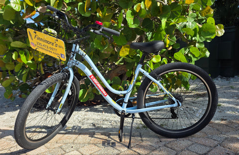 Light blue step-through cruiser rental bike with front basket from Finnimore's Cycle Shop, Sanibel